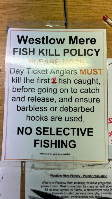 Westlow Mere fish kill policy sign detailing catch and release rules for anglers.